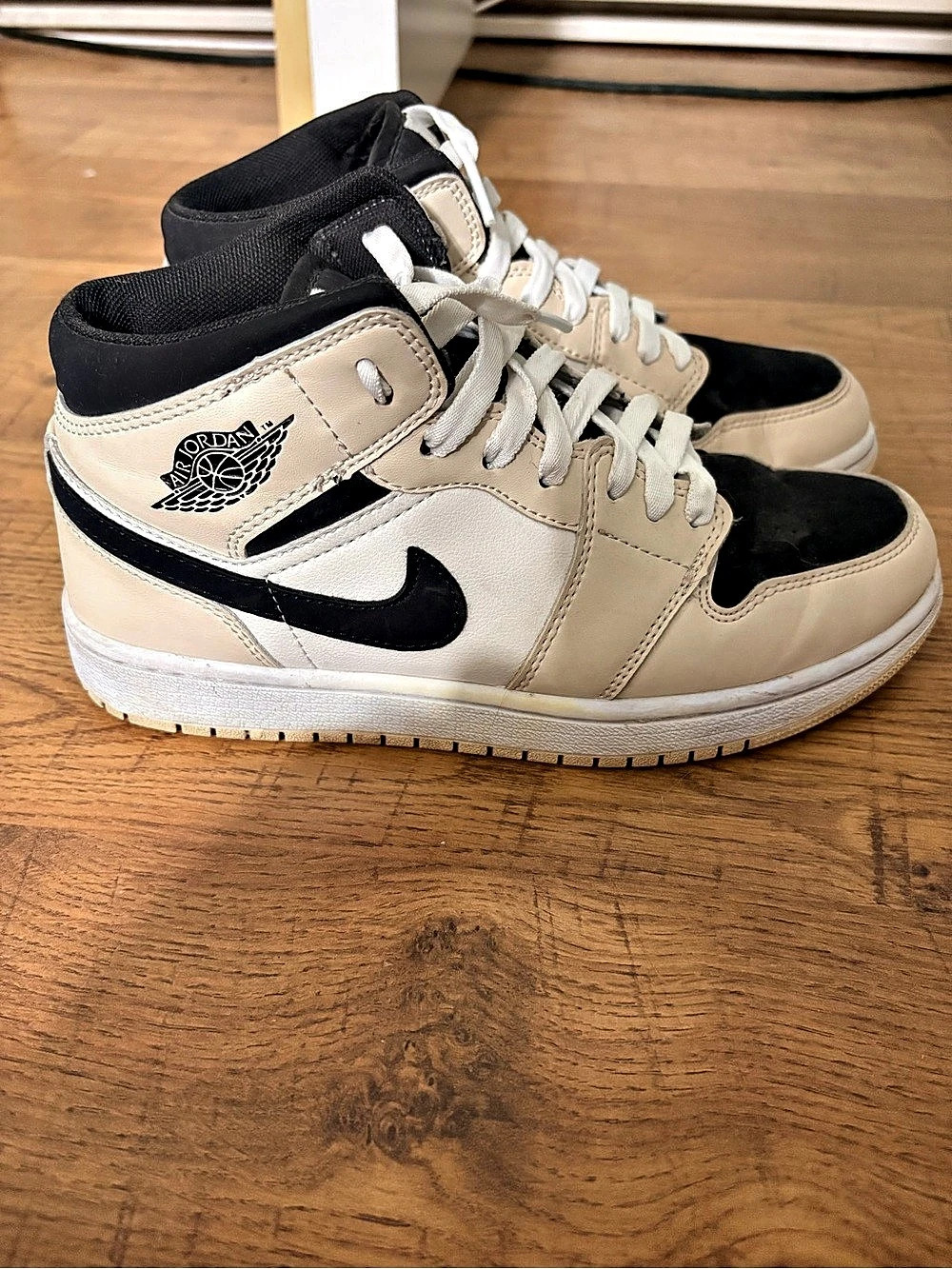 Nike Air Jordan 1 Mid Sneakers in White & Black